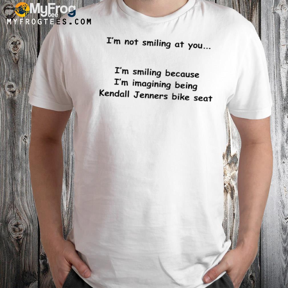 I'm not smiling at you I'm smiling because I'm imaging being kendall jenners bike seat shirt